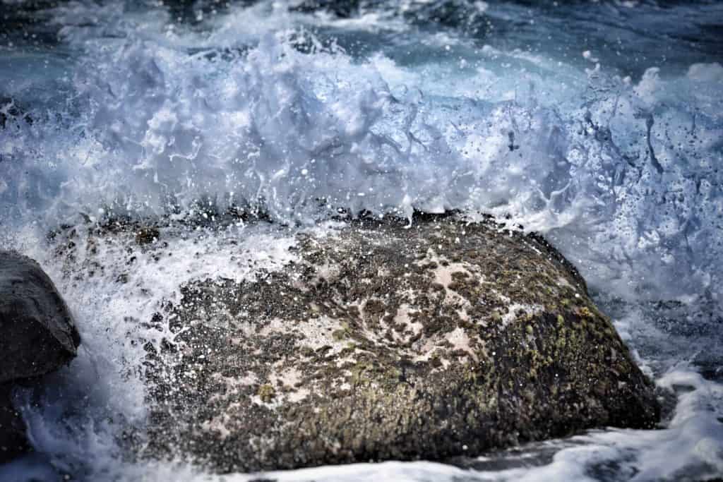 Waves Breaking Over Rock