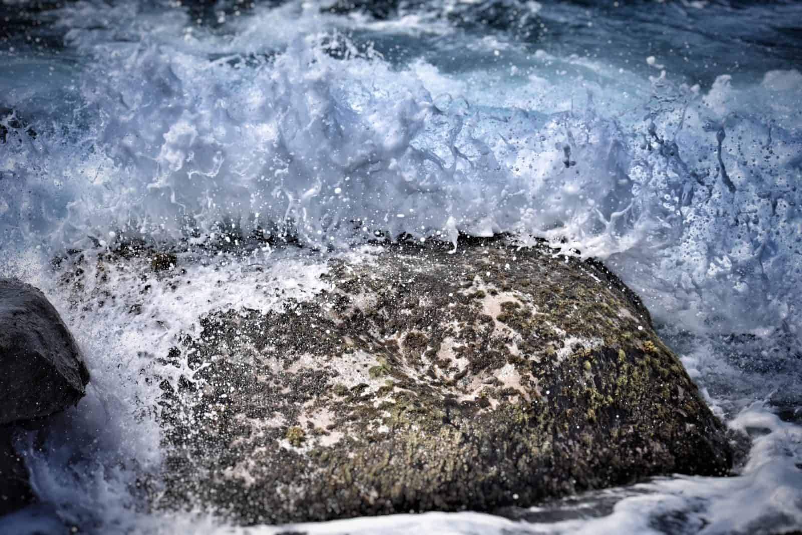 Waves Breaking Over Rock